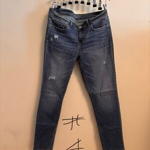 Blue Skinny Jeans with Distressed Details